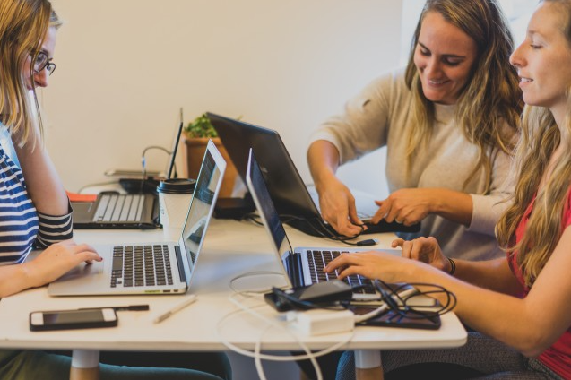 Coworkers working with each other and motivated